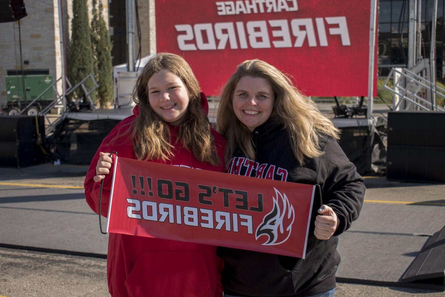 A couple of Firebirds fans show their spirit at Homecoming.